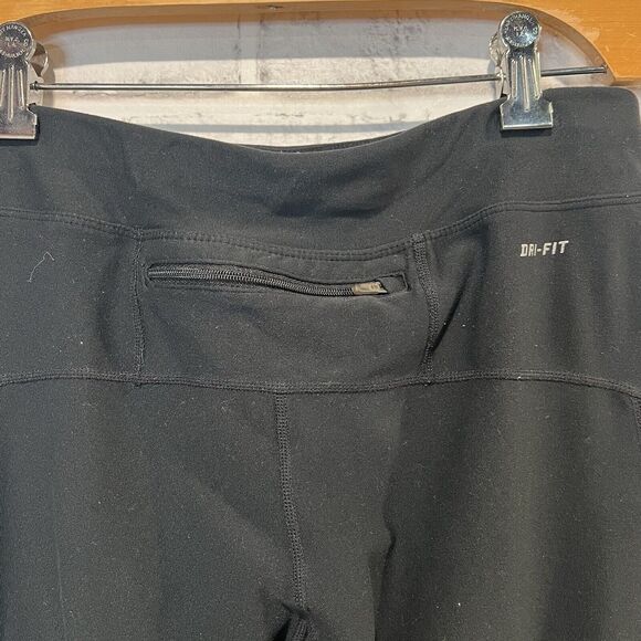 NIKE Running Dri Fit Stretch Zip Ankle & Zip Pocket Leggings Women's Size M - Picture 5 of 9
